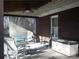 Relaxing screened porch with seating and ceiling fan at 4819 Vander Ln # 54, Monroe, NC 28110