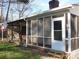 Spacious screened porch with seating and a view of the backyard at 4819 Vander Ln # 54, Monroe, NC 28110