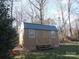 Brown storage shed with metal roof and steps at 4819 Vander Ln # 54, Monroe, NC 28110