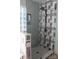 Modern bathroom with patterned tile shower and glass enclosure at 503 Bridgestone Ct, Gastonia, NC 28056