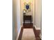 Elegant hallway with hardwood floors and ornate mirror at 503 Bridgestone Ct, Gastonia, NC 28056