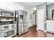 Modern kitchen with stainless steel appliances, sleek countertops, and ample cabinet space at 503 Bridgestone Ct, Gastonia, NC 28056