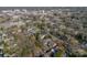 Aerial view showing home's location in a tree-lined neighborhood near the town center at 506 S Chester St, Gastonia, NC 28052