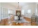 Elegant dining room with hardwood floors and fireplace at 506 S Chester St, Gastonia, NC 28052