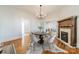 Elegant dining room with hardwood floors and fireplace at 506 S Chester St, Gastonia, NC 28052