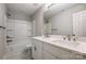 Modern bathroom with bathtub, double vanity, and toilet at 5107 Lakeview Rd, Charlotte, NC 28216