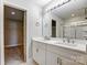 Modern bathroom with double vanity and a walk-in shower at 5107 Lakeview Rd, Charlotte, NC 28216