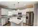 Modern kitchen with stainless steel appliances and granite countertops at 5107 Lakeview Rd, Charlotte, NC 28216