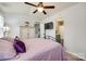 Bright bedroom with a view of the bathroom and a large TV at 517 Fenton Pl, Rock Hill, SC 29732