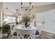 Bright dining area with chandelier and white table at 517 Fenton Pl, Rock Hill, SC 29732