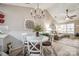 Bright dining area with chandelier and white table at 517 Fenton Pl, Rock Hill, SC 29732