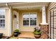 Front porch with brick columns and potted plants at 517 Fenton Pl, Rock Hill, SC 29732