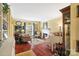 Living room with hardwood floors, a fireplace, and beige sofas at 5915 Quail Hollow Rd # E, Charlotte, NC 28210