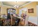 Formal dining room with dark wood table and hutch at 5915 Quail Hollow Rd # E, Charlotte, NC 28210