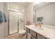 Modern bathroom with a large shower and gray vanity at 6027 Towering Oaks Dr, Charlotte, NC 28205