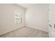 Spacious bedroom with neutral decor and ample natural light at 6027 Towering Oaks Dr, Charlotte, NC 28205