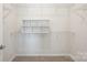 Walk-in closet with wire shelving and built-in organizer at 6027 Towering Oaks Dr, Charlotte, NC 28205