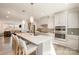 Open concept kitchen features stainless steel appliances and an island at 6027 Towering Oaks Dr, Charlotte, NC 28205