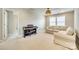 Bright bonus room with comfy seating and piano at 6265 Six String Ct, Fort Mill, SC 29708