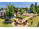 Community fire pit with seating and walking path nearby at 6265 Six String Ct, Fort Mill, SC 29708