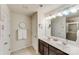 Double vanity bathroom with a walk-in shower at 6417 Union Station Ct, Charlotte, NC 28210