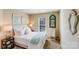 Cozy bedroom with a queen-size bed and window seating at 6417 Union Station Ct, Charlotte, NC 28210