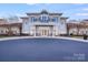 Community clubhouse featuring a grand facade and welcoming entrance at 6417 Union Station Ct, Charlotte, NC 28210