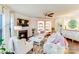 Cozy living room features a fireplace, built-in shelving, and comfortable seating at 6417 Union Station Ct, Charlotte, NC 28210