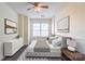 Spacious bedroom with hardwood floors and window at 6808 Cascade Dream Ct # 118, Huntersville, NC 28078