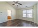 Bedroom with hardwood floors and en-suite bathroom at 6808 Cascade Dream Ct # 118, Huntersville, NC 28078