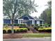 Community clubhouse with landscaping at 6808 Cascade Dream Ct # 118, Huntersville, NC 28078