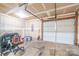 Spacious garage with overhead door and ample storage space at 6808 Cascade Dream Ct # 118, Huntersville, NC 28078