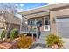 Inviting front porch with grey deck and railing at 703 Marion Dr, Matthews, NC 28105