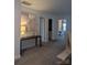 Upper hallway with access to bedrooms and bath at 703 Marion Dr, Matthews, NC 28105