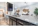 Modern kitchen with granite countertops and stainless steel appliances at 7216 Somerford Rd, Charlotte, NC 28215