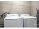 Convenient laundry room with a washer and dryer at 7216 Somerford Rd, Charlotte, NC 28215