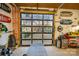 Garage with view of lake through glass door at 7476 Point St, Denver, NC 28037