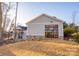 Detached garage with large glass door and stone accents at 7476 Point St, Denver, NC 28037