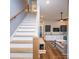 Modern staircase leading to additional living space at 7476 Point St, Denver, NC 28037