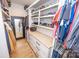 Spacious walk-in closet with ample shelving and drawers at 7476 Point St, Denver, NC 28037