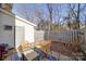 Private backyard with patio, seating area, and storage shed at 8465 Ramath Dr, Charlotte, NC 28211