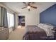 Serene bedroom with a dresser, large bed, and ceiling fan at 8465 Ramath Dr, Charlotte, NC 28211