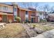 Townhome complex exterior, showcasing multiple units and landscaping at 8465 Ramath Dr, Charlotte, NC 28211