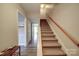 Carpeted staircase leading to the upper level of the home at 8465 Ramath Dr, Charlotte, NC 28211