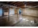 Spacious unfinished basement offering workshop or storage potential at 940 Valley Dr, Newton, NC 28658