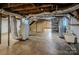 Unfinished basement area with HVAC systems and utility sink at 940 Valley Dr, Newton, NC 28658