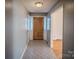 Bright entryway with tile flooring and wood door at 940 Valley Dr, Newton, NC 28658