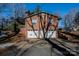 Two-car garage with double doors and brick exterior at 940 Valley Dr, Newton, NC 28658