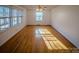 Spacious living room featuring hardwood floors and large windows at 940 Valley Dr, Newton, NC 28658