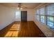 Bright living room with hardwood floors and a view to another room at 940 Valley Dr, Newton, NC 28658